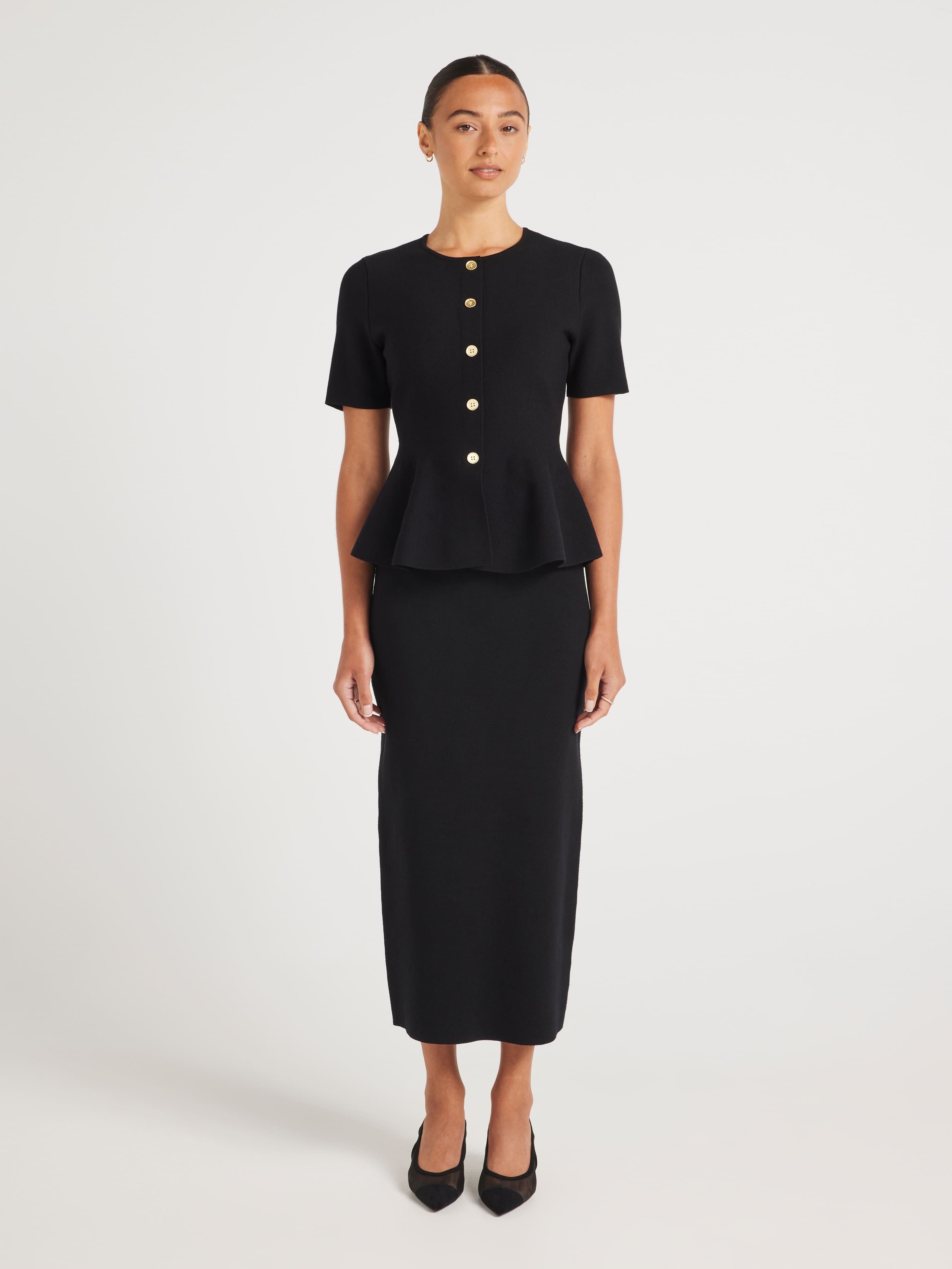 Britney Peplum Short Sleeve Knit