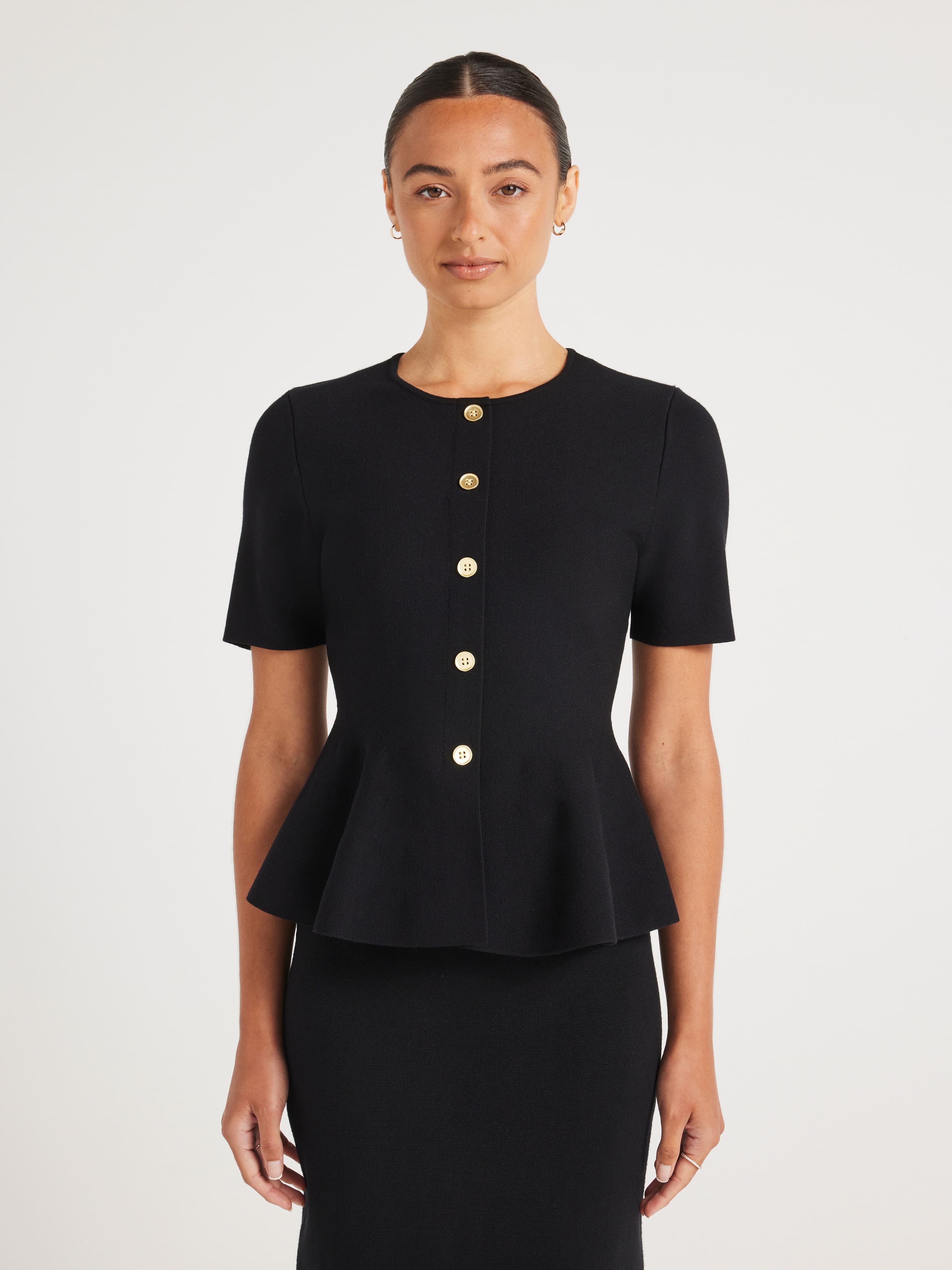 Britney Peplum Short Sleeve Knit